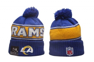 NFL Los Angeles Rams New Era Royal 2024 Sideline Sport Cuffed Knit Beanie Hat With Pom 5011