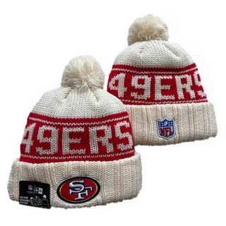 Wholesale NFL San Francisco 49ers New Era Cream 2024 Sideline Cuffed Knit Hat with Pom 3059