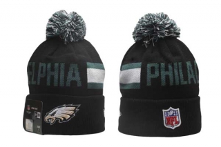 Wholesale NFL Philadelphia Eagles New Era Black 2024 Sideline Tech Knit Beanies Hat With Pom 5021