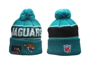 NFL Jacksonville Jaguars New Era Teal 2024 Sideline Sport Cuffed Knit Beanie Hat With Pom 5012