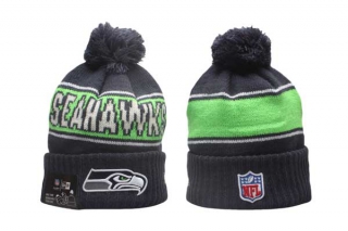 NFL Seattle Seahawks New Era Navy 2024 Sideline Sport Cuffed Knit Beanie Hat With Pom 5019