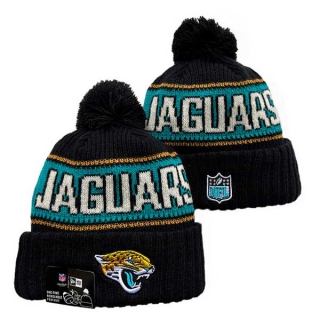 Wholesale NFL Jacksonville Jaguars New Era Black 2024 Sideline Cold Weather Cuffed Knit Hat with Pom 3033