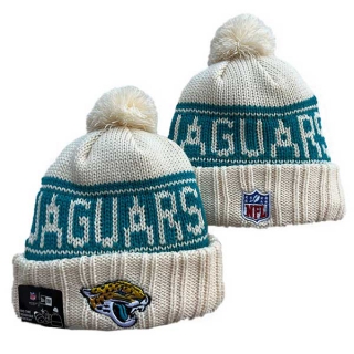 Wholesale NFL Jacksonville Jaguars New Era Cream 2024 Sideline Cuffed Knit Hat with Pom 3034