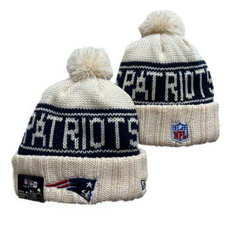 Wholesale NFL New England Patriots New Era Cream 2024 Sideline Cuffed Knit Hat with Pom 3065