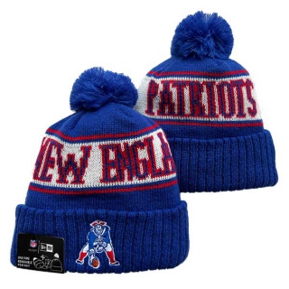 Wholesale NFL New England Patriots New Era Royal 2024 Sideline Cold Weather Cuffed Knit Hat with Pom 3067