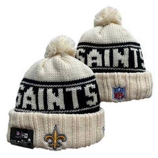 Wholesale NFL New Orleans Saints New Era Cream 2024 Sideline Cuffed Knit Hat with Pom 3053