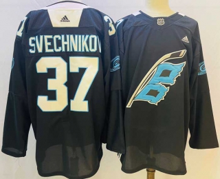 Men's NHL Carolina Hurricanes #37 Andrei Svechnikov 2022 Black Adidas Jersey